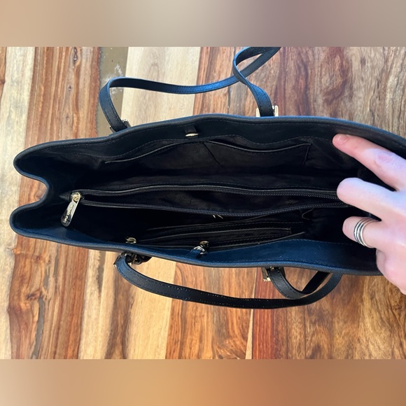 Black hard leather Michael kors handbag. 14 inches wide by 10 inches tall. - Picture 4 of 7